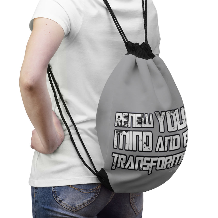 BE TRANSFORMED Drawstring Bag